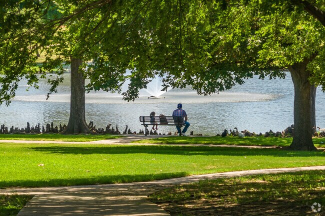 Hurst residents enjoy relaxing by the water at Chisholm Park.