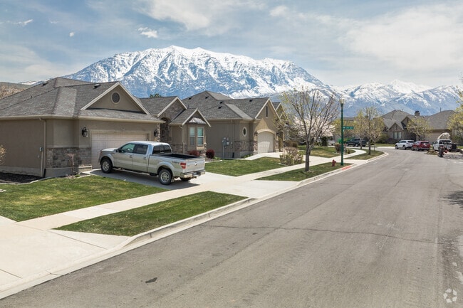 Ivory Homes charmingly line a neighborhood street in Windsor.