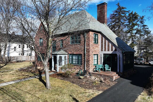 A lovely example of a brick Tudor in Pine Hills.