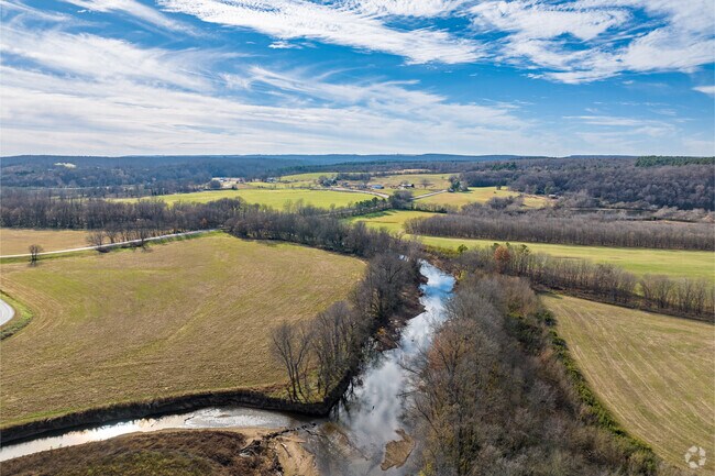 The Illinois River crosses through West Outer Fayetteville.