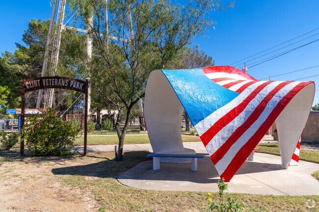 Enjoy a serene afternoon picnic at Clint Veterans Park, a place of reflection and relaxation.