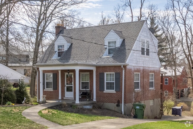 Historical revival style homes in Fort Mitchell showcase bay facades and roof dormers.