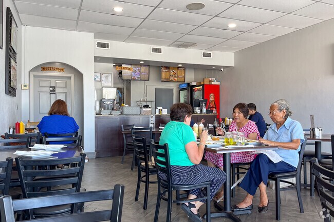 Local diners at Victorias Peruvian Restaurant in  Ocean Breeze neighborhood.