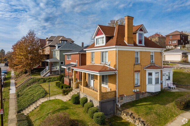 American Foursquare homes are perched on hilly plateaus with scenic views of West View Borough.