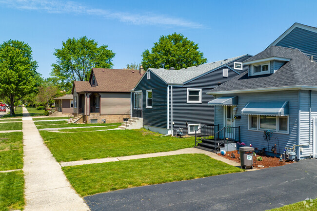 Well maintained sidewalks, private driveways and a variety of housing styles can be found in Forest View.