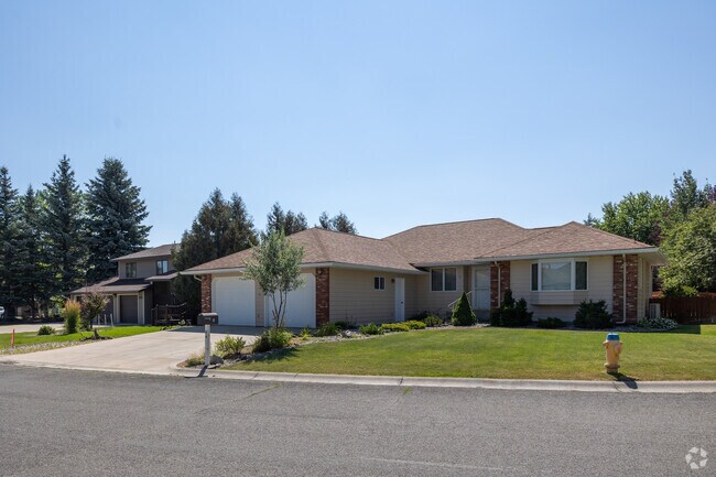 Quiet suburban streets lined with charming homes in North Central Helena.