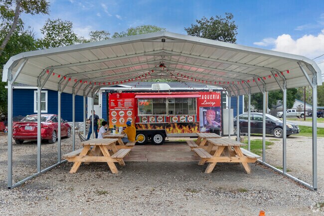 Taqueria Lucy's inviting charm with outdoor seating in Barrett is a flavorful culinary escape.