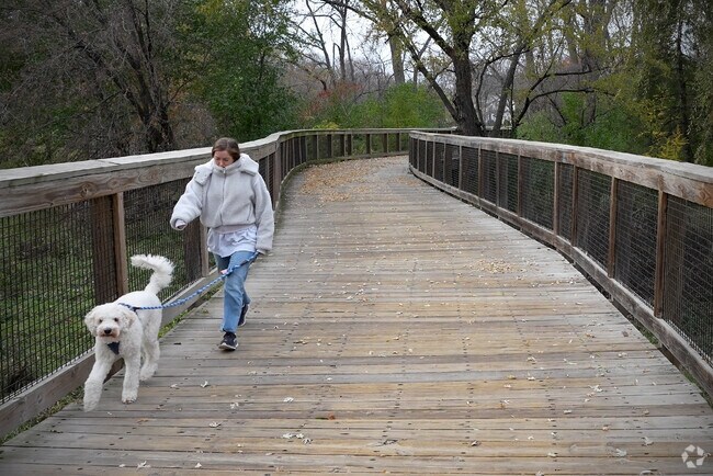 Discover The Heights on foot, wheels, or with your dog on Nine Mile Creek Trail.