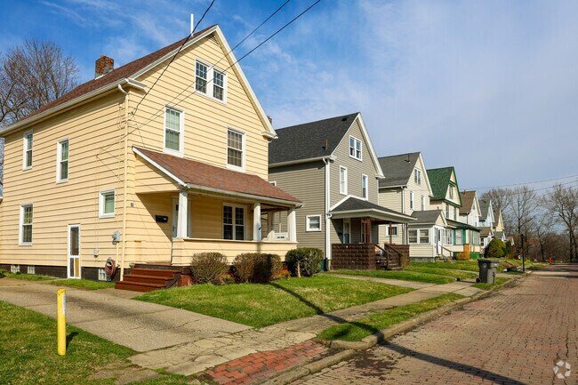 Charming bungalows line a brick-paved road in the Schenley neighborhood.