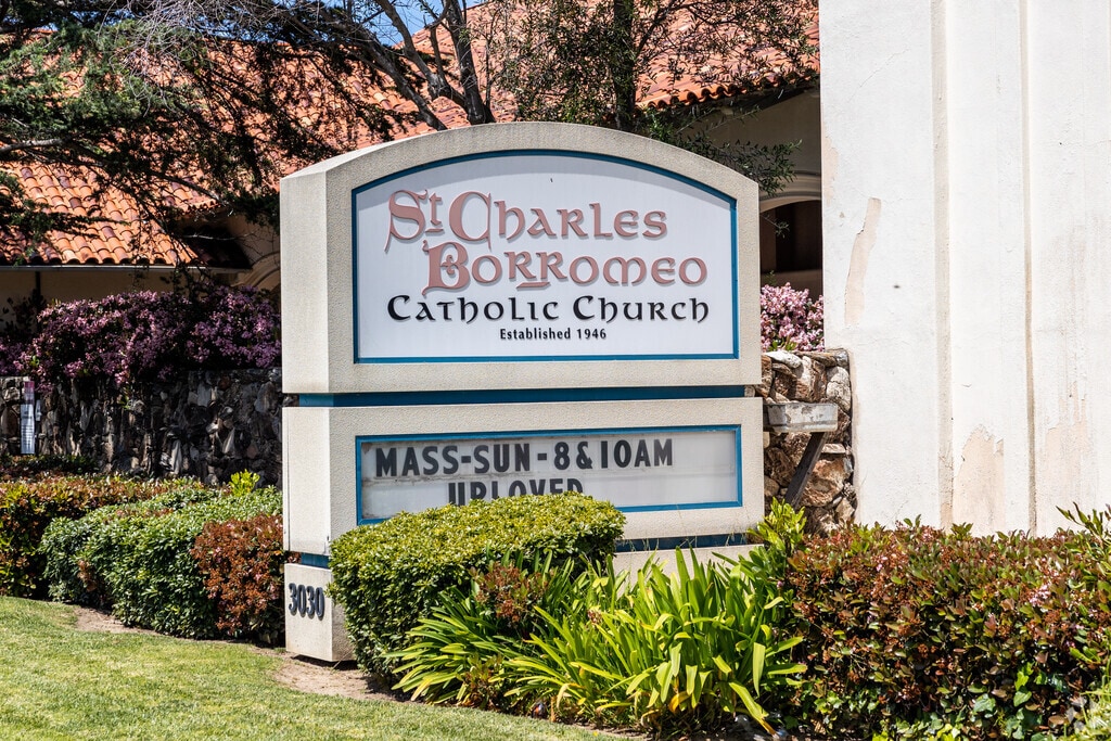 An Entrance Sign to Saint Charles Borromeo Catholic Church and Academy Located in Loma Portal.