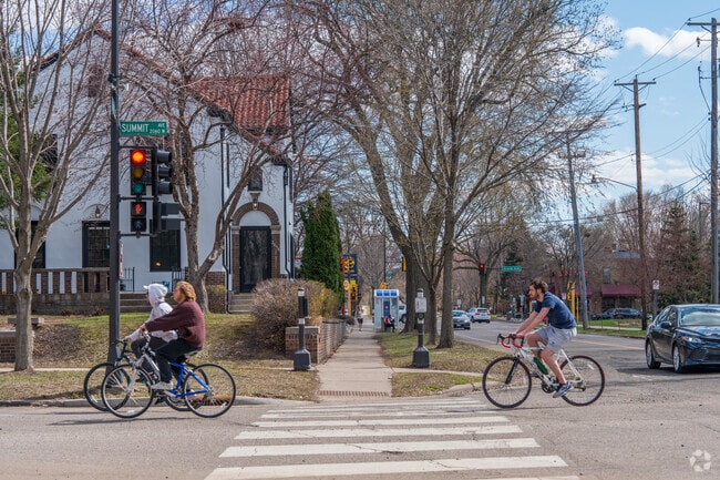 Cyclists making their way down Summit  Ave in the Macalester-Groveland neighborhood.