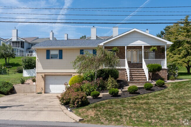 This ranch-style home in Swoyersville offers a lower level garage.