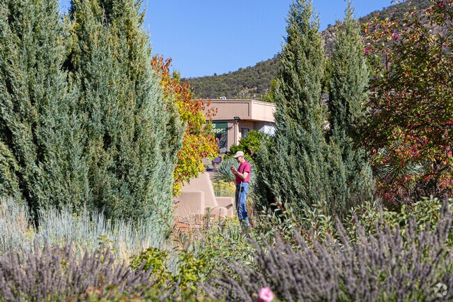 A man takes in the beauty of The Santa Fe Botanical Gardens in Southeast.