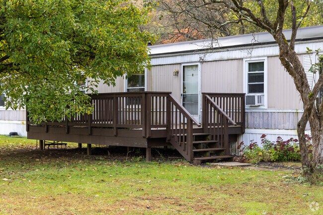Manufactured homes with spacious decks appear across the township.
