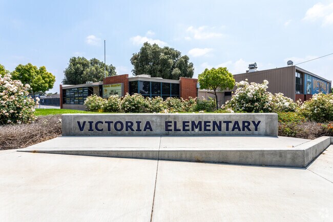 The signage of Victoria Elementary School proudly represents a beacon of education