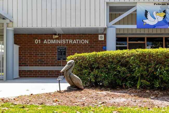 Pelican Marsh Elementary School in Naples features a pelican statue at the entrance.