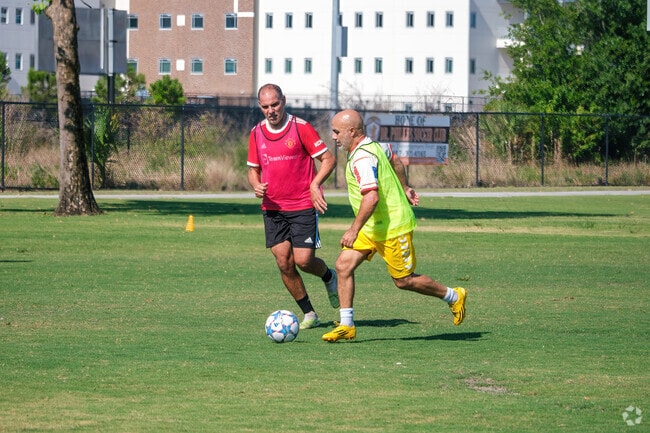 Dr. Phillips residents enjoy playing soccer at the Dr. Phillips Community Park.