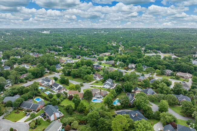 Woodberry Forest is a tree-covered neighborhood just 7 miles from the beach.