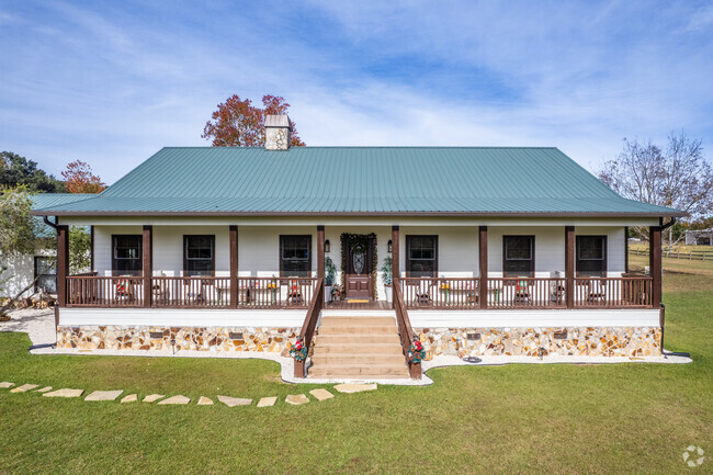 Raised Farm-style homes with vast land easily found in South Orchards.