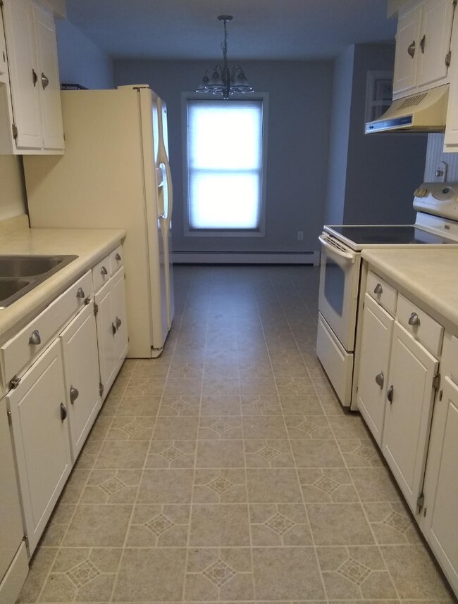 View of kitchen & dining area