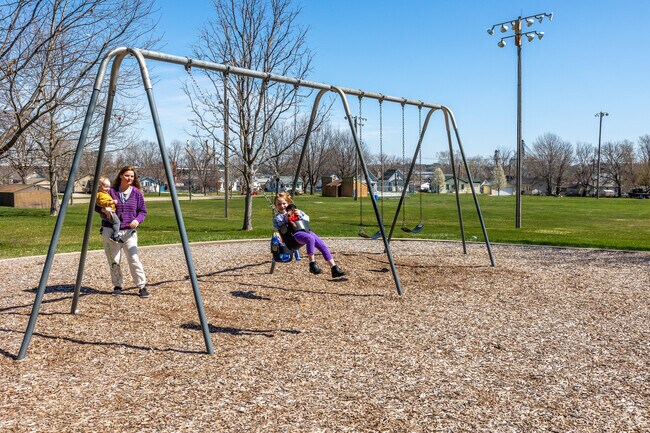 Ashfield Park's playground overlooks a larger open field, perfect for soccer and football games.