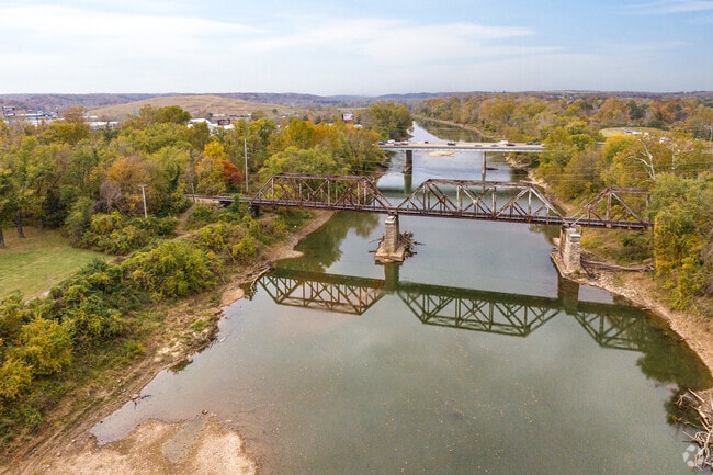 The Meramec River flowing under a railway bridge and Hwy 141 in Peerless Park.