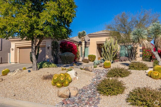 Many southwestern style homes in Boulders feature desert landscaping.