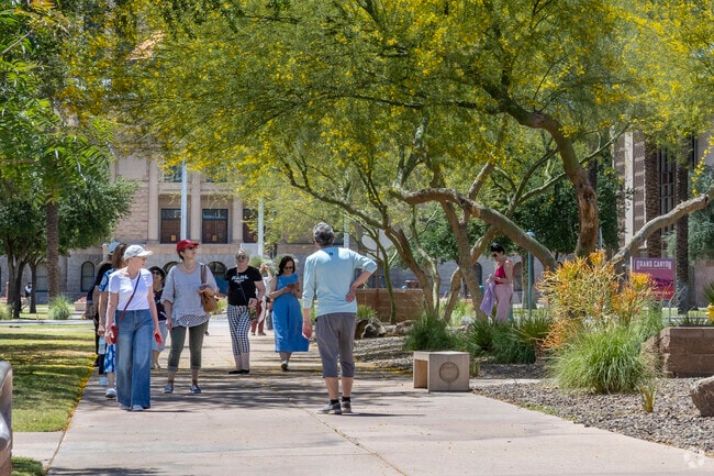 Locals tour the Arizona Capitol grounds in Governmental Mall.