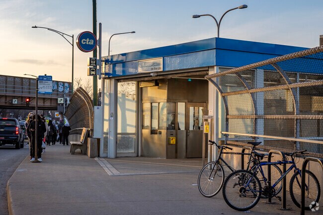 CTA Blue Line entrance with bus stops and bike parking make Irving Park very transit friendly.