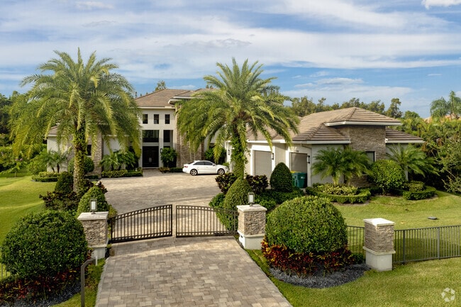 A gated luxurious estate in the Plantation Acres neighborhood of Sunrise, FL.