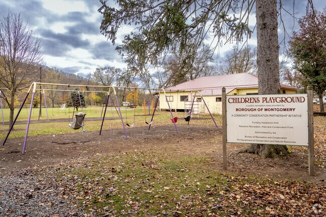 Montgomery Park by the river offers playgrounds and sports fields for families.