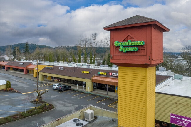 Decorative pillars enhance the entrance to Greenhouse Square, welcoming visitors and shoppers.