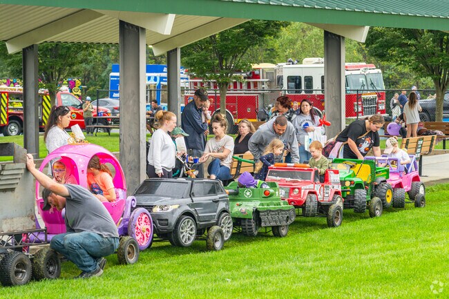 The Lebanon community sets up rides for the kids at National Night Out.