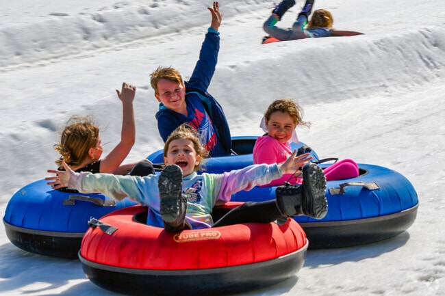 Kids love the tubing hill at Hawk Island Park.