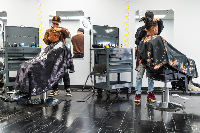 The chairs are often full at Ideal Style Barbershop in Clarksville,
