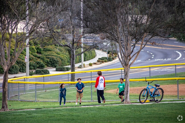 Neighborhood kids play after school at Tuscany Hills Park.