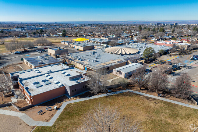 Grant Middle School with downtown Albuquerque in the background.