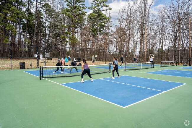 Summerfield residents love playing pickleball at nearby Bur-Mil Park.