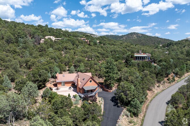 Set along private, winding roads, many Hyde Park homes offer expansive lots for privacy.
