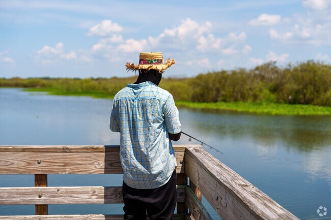 A Florida resident visits Plantation Estates' Gemini Springs Park for fishing.