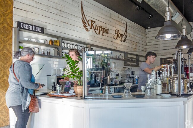 Grab a delicious coffee with friends at Kuppa Joy in the Maroa neighborhood.