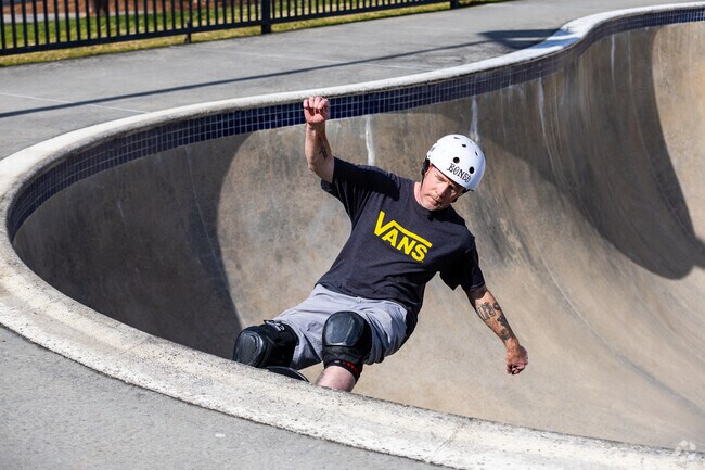 Guy shredding at the skate park in Dunwoody, GA.