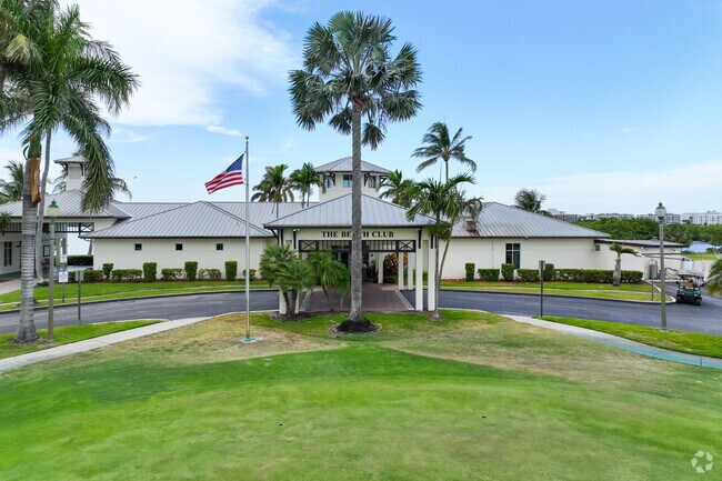 Get a golf cart for a day out on the green at the Lake Worth Beach Golf Course in Parrot Cove.