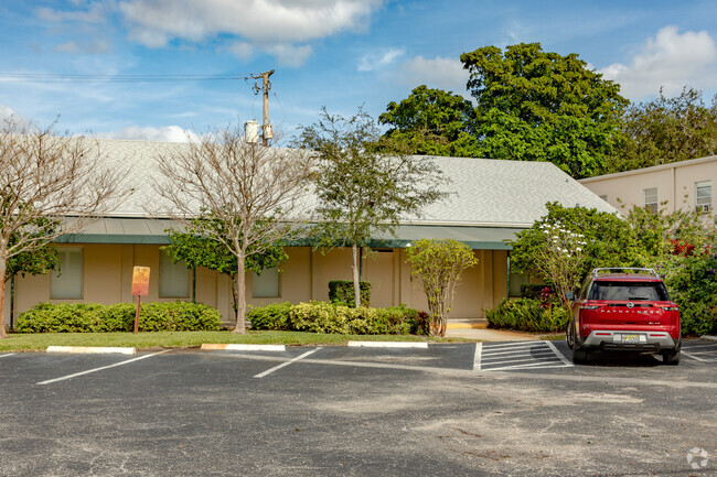 Lush landscaping surrounds Lighthouse Christian Academy in Ft Lauderdale, FL.