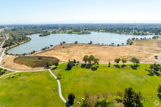 Lake Elizabeth and scenic boat rides await near Kimber-Gomes’ Central Park.