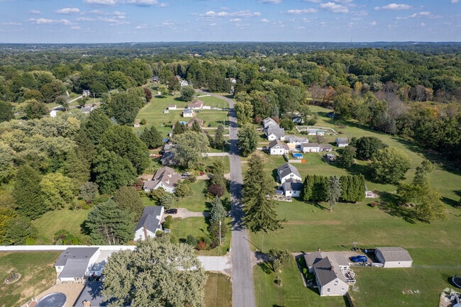Aerial view of East Barberton with beautiful residential homes throughout.