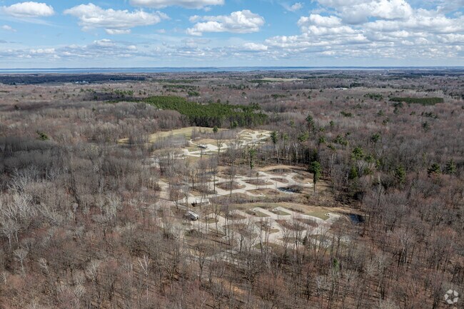The Brown County Reforestation Camp offers hiking, fishing, picnic spots, and winter sports.