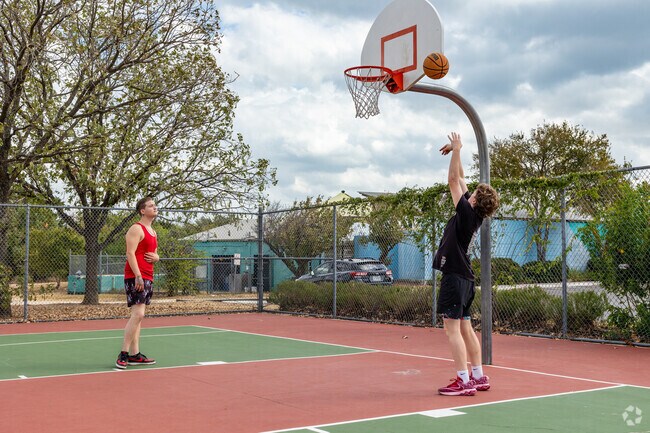 Residents can shoot some hoops on the courts of Dick Nichols Park.