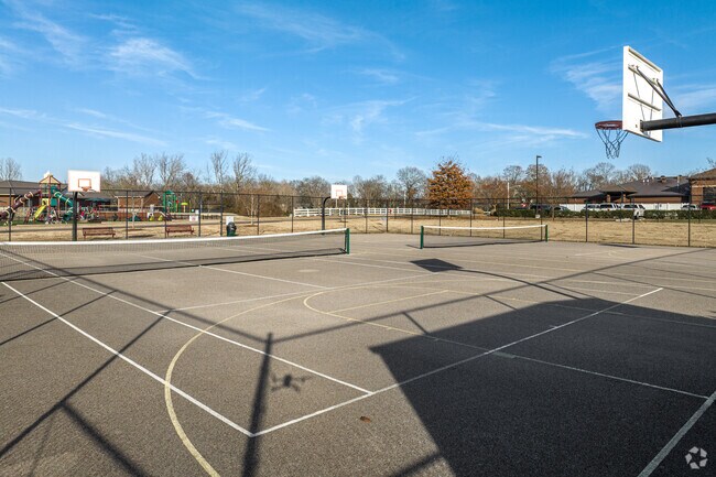 Shoot some hoops with friends at Fischer Park, a scenic spot in Spring Hill.