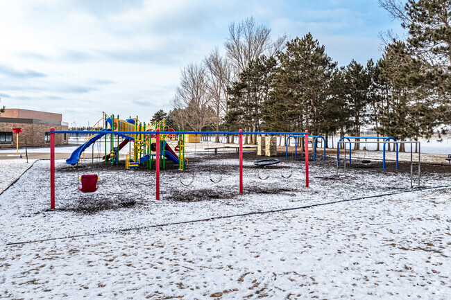 Experience playtime joy at C.E. Jacobson Elementary's dynamic and colorful playground.